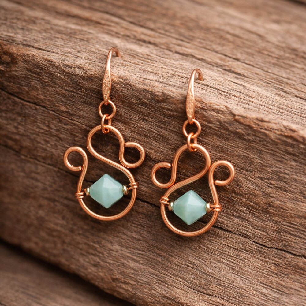 Handmade stunning copper wire scroll earrings! 18k rose gold filled ear wires.
